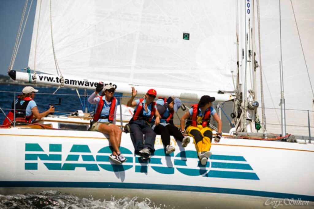 women competing in sailing race